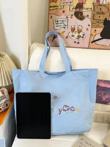 Bolso tote de nailon azul para mujer, bolso de hombro impermeable grande con bordado bonito.