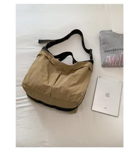 Stylish casual nylon shoulder bag with large capacity, perfect for daily commute.