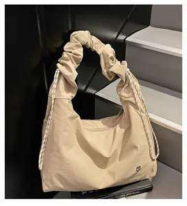 Casual travel crossbody bag, slouchy shoulder design, large capacity lightweight gym travel bag.