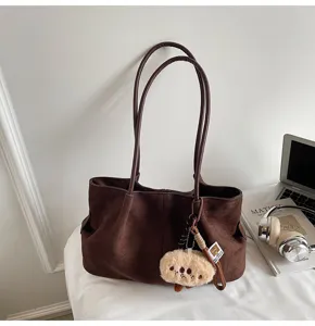 Brown suede tote bag, vintage large capacity shoulder bag with cute plush pendant for daily commute.