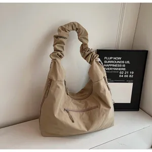 Casual travel messenger bag, large capacity lightweight slouchy shoulder bag for daily use.