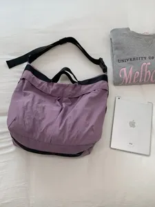 Casual purple nylon shoulder bag, large capacity crossbody bag for commute and daily use.