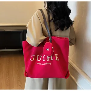 Casual canvas tote bag, large capacity shoulder bag for daily commute, shopping, and travel.