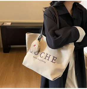 Casual canvas tote bag for women, large capacity shoulder bag with small coin purse, stylish.