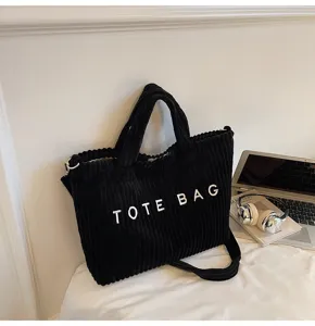 Black corduroy tote bag for women, large capacity casual shoulder and crossbody bag.