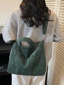 Korean style dark green corduroy tote bag casual large capacity shoulder crossbody bag for daily use.