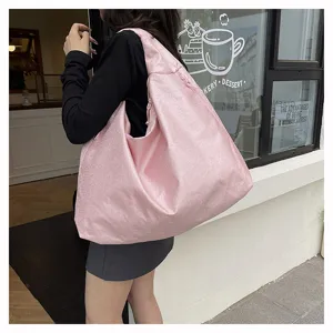Pink large capacity casual shoulder bag, stylish pink tote bag detail view for daily commute.