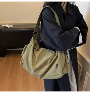 Casual large capacity nylon shoulder crossbody tote bag for daily commute travel student style.