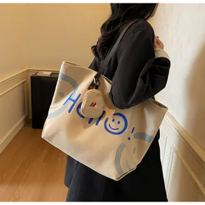Large capacity canvas tote bag, casual shoulder bag with cute hello print and coin purse.