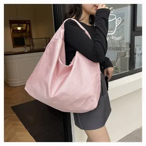 Casual large capacity pink shoulder tote bag for daily commuting travel shopping.