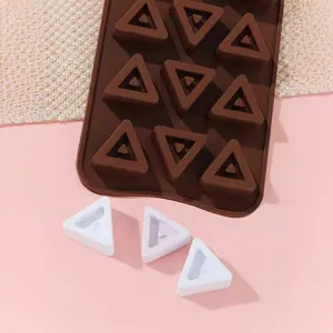Triangle silicone mold detail showing flexible baking tray and finished triangular pieces.