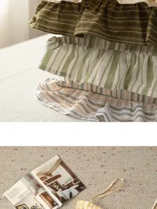 Detailed view of cotton striped chair cushion, showing soft fabric and vintage aesthetic.