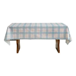 Blue and pink plaid rectangular tablecloth with scalloped edges for home dining table decor.