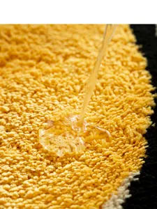 Absorbent shaggy floor mat detail showcasing fluffy texture and water resistance.