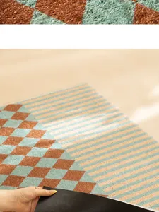 PVC loop door mat detail showing textured checkered surface and non-slip backing design.