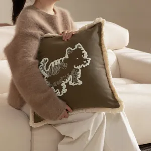 Decorative square throw pillow cover with cute dog embroidery and stylish tassel fringe design.