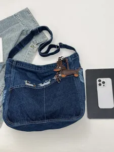 Casual denim shoulder bag with cute dachshund embroidery and leather charm, large capacity.