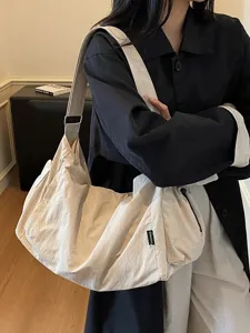 Large capacity casual shoulder bag, versatile slouchy tote bag for daily commute and travel.