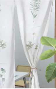 Linen style botanical print door curtain detail view, elegant partition curtain for home decor.