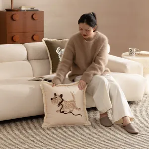 Detailed view of the cute embroidered dog cushion, perfect for sofa and living room decor.
