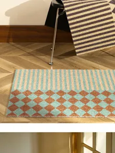 Detailed view of mid-century retro geometric striped door mat with anti-slip loop pile texture.