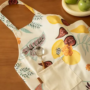 Kitchen apron stylish waterproof floral print cooking apron with pocket for home use.