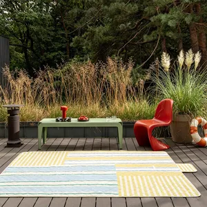 Thickened waterproof outdoor picnic mat with colorful geometric stripes for camping and beach.