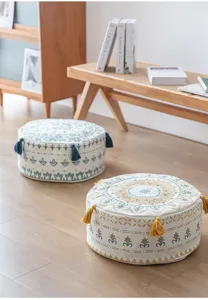 Nordic minimalist geometric printed floor pouf cushion with elegant tassels, perfect for living room decor.