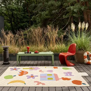 Thick waterproof outdoor picnic mat with cute dopamine cartoon patterns for camping and beach.