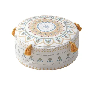 Nordic bohemian floral printed round floor cushion with yellow tassels for living room cozy.