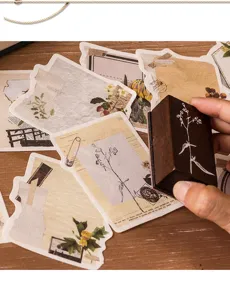 Vintage botanical collage material paper and wooden stamp set for scrapbooking and journaling.