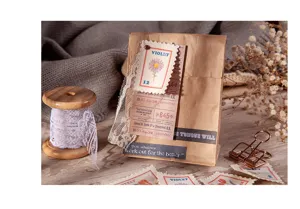 Kit de matériel d'autocollants vintage pour journal avec sac en kraft et dentelle.