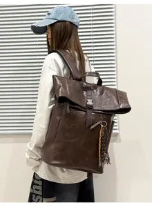 Large capacity roll-top leather backpack, stylish casual commuter school bag for daily use.