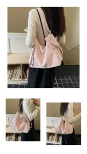 Casual vintage large capacity slouchy shoulder tote bag detail view, soft pink everyday purse.