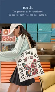 Bolso tote de lona casual con estampado de mariposas y gran capacidad para uso diario.