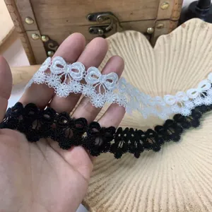 White and black bow lace trim, 3cm wide hollow embroidered ribbon for DIY doll clothes and crafts.