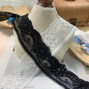Black and white lace trim detail shot, 5cm width hollow embroidery for DIY crafts.