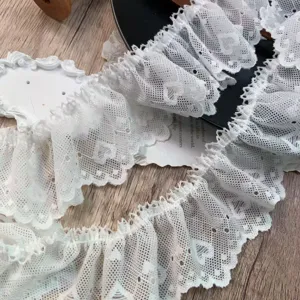 Detailed view of 5cm wide white heart pleated lace trim, perfect for DIY Lolita crafts.