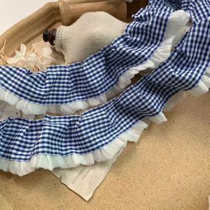 Detail of 4cm blue white gingham ruffled lace trim, ideal for doll clothes and DIY crafts.