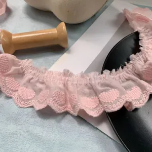 Pink pleated lace trim with heart embroidery for DIY crafts, doll clothes, and garment collars.