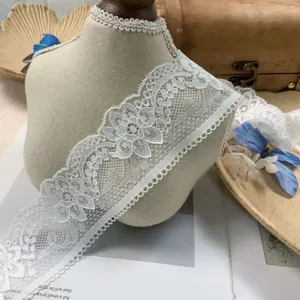 White lace trim detail shot, 5cm hollow embroidery ribbon for DIY clothing cuffs and hair bow.