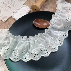6.5cm white embroidered lace trim, delicate floral ruffle fabric for DIY crafts and doll clothes.