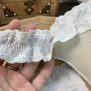 Detailed view of the 4.5cm wide off-white gathered cotton lace trim for DIY decor.