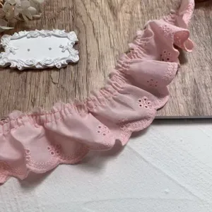 Pink 4.5cm embroidered lace trim, hollow cotton wave ruffle detail for DIY garments and crafts.