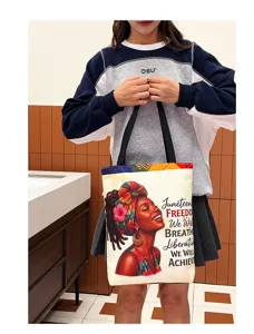 Canvas tote bag with black art design, stylish shoulder bag for daily use and gifts.