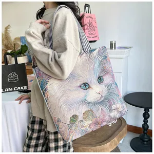 Detailaufnahme der großen Segeltuch-Tragetasche mit Vintage-Katzenmuster für den Alltag.