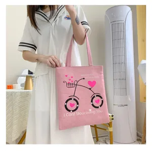 Borsa shopper in tela rosa con stampa di bicicletta carina e tracolla per la spesa quotidiana.