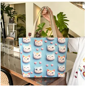 Detalle bolso tote de lona con lindo gato 3D, bolsos hombro casuales con asas resistentes.
