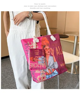 Sac cabas en toile pour femme avec imprimé fille noire élégant et pochette assortie.