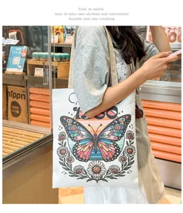 Bolso tote de lona con estampado de mariposas, bolso de hombro casual grande para uso diario.